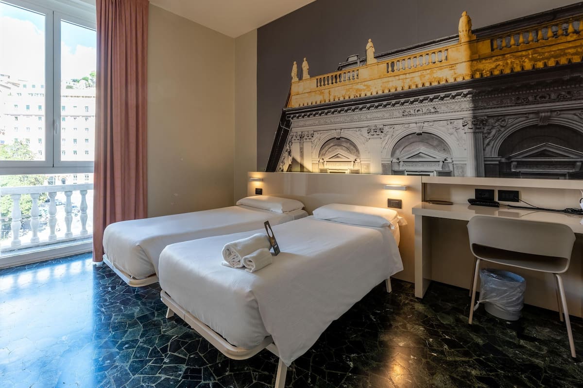 Standard Twin Room, Non Smoking | In-room safe, desk, laptop workspace, iron/ironing board