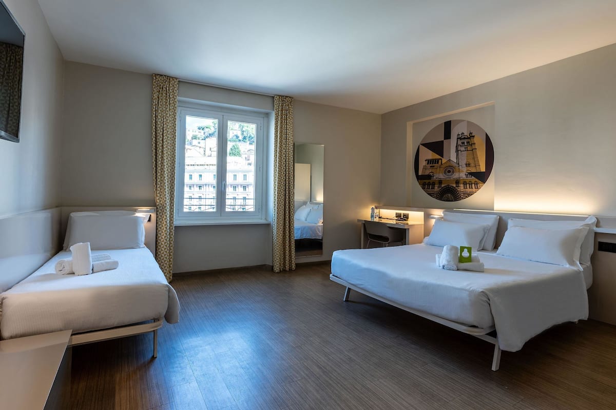 Superior Triple Room | In-room safe, desk, laptop workspace, iron/ironing board