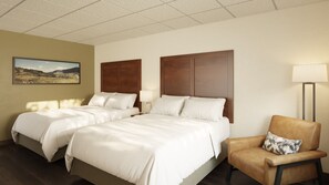 Premium bedding, pillow-top beds, in-room safe, desk