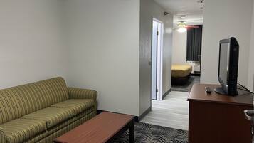 Premium bedding, blackout curtains, iron/ironing board