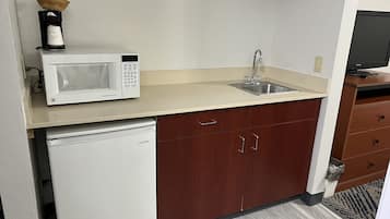 Premium bedding, blackout curtains, iron/ironing board