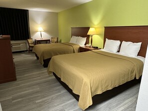 Premium bedding, blackout drapes, iron/ironing board