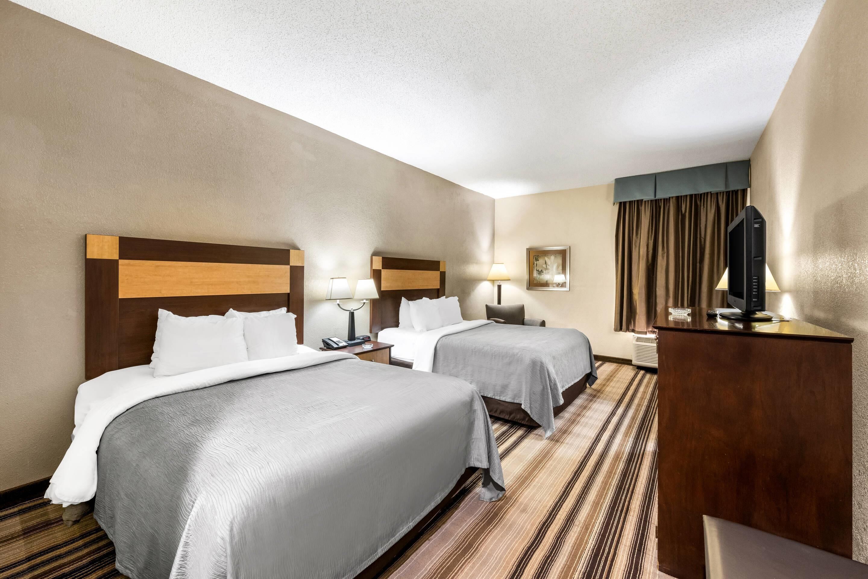 Standard Room, 2 Queen Beds, Non Smoking | Desk, blackout curtains, iron/ironing board, free WiFi