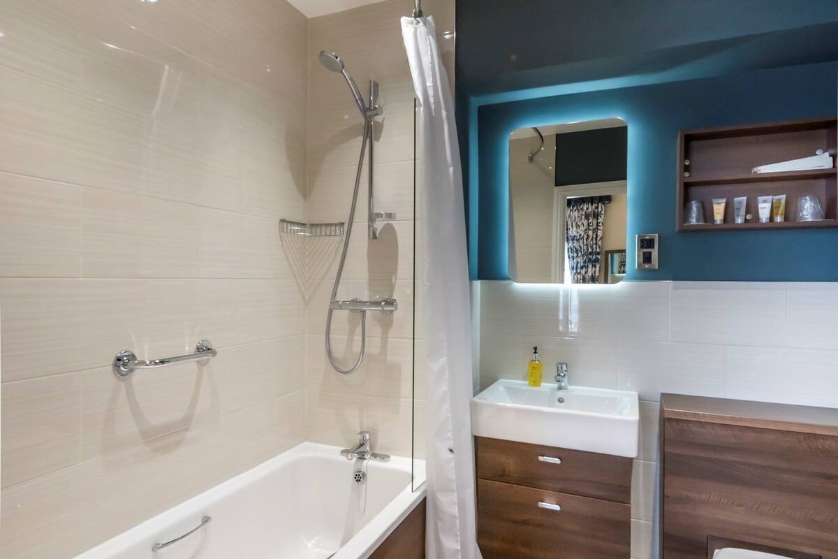 1 bedroom, desk, blackout curtains, iron/ironing board