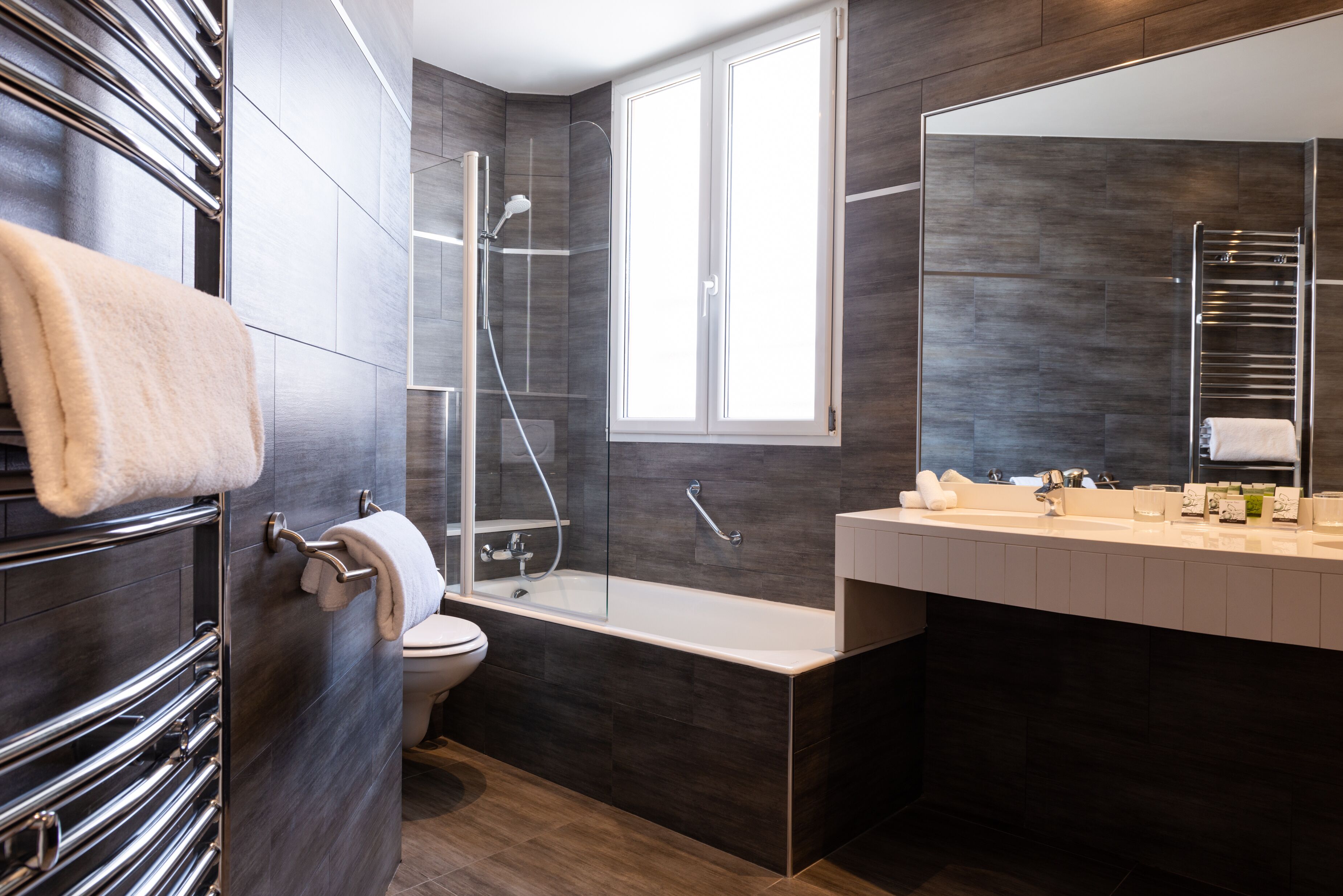 superior room | bathroom | designer toiletries, hair dryer, bathrobes, slippers