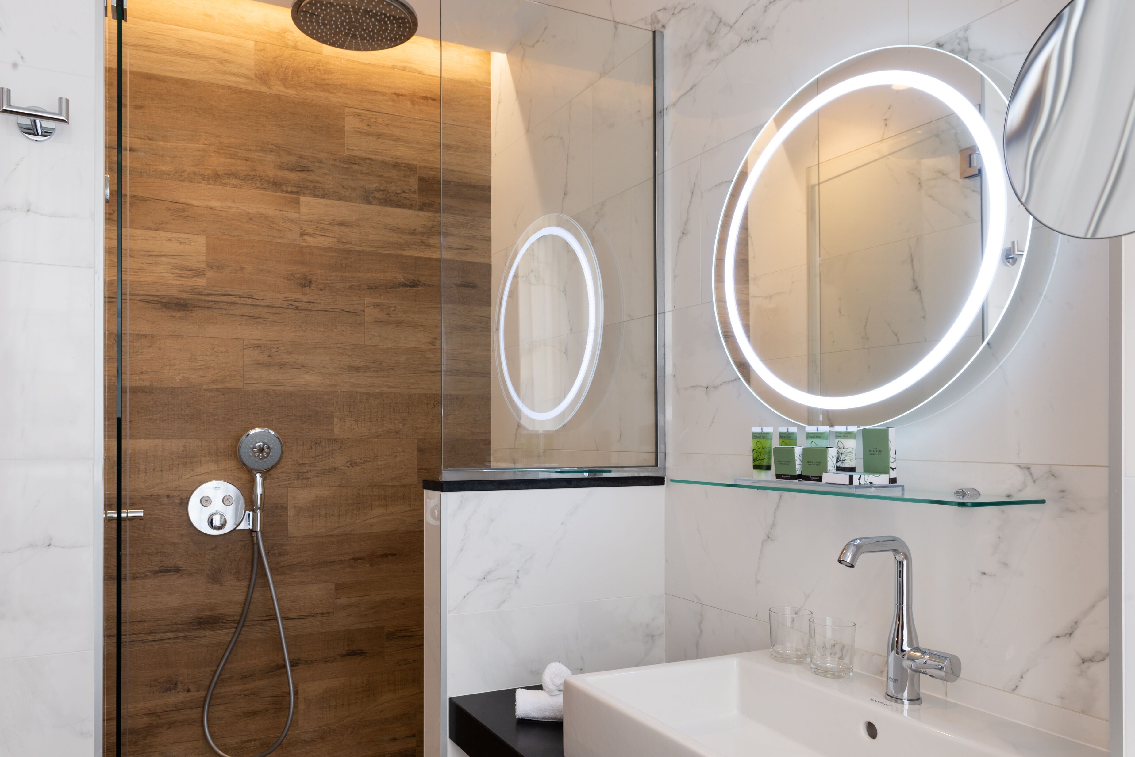 designer toiletries, hair dryer, bathrobes, slippers