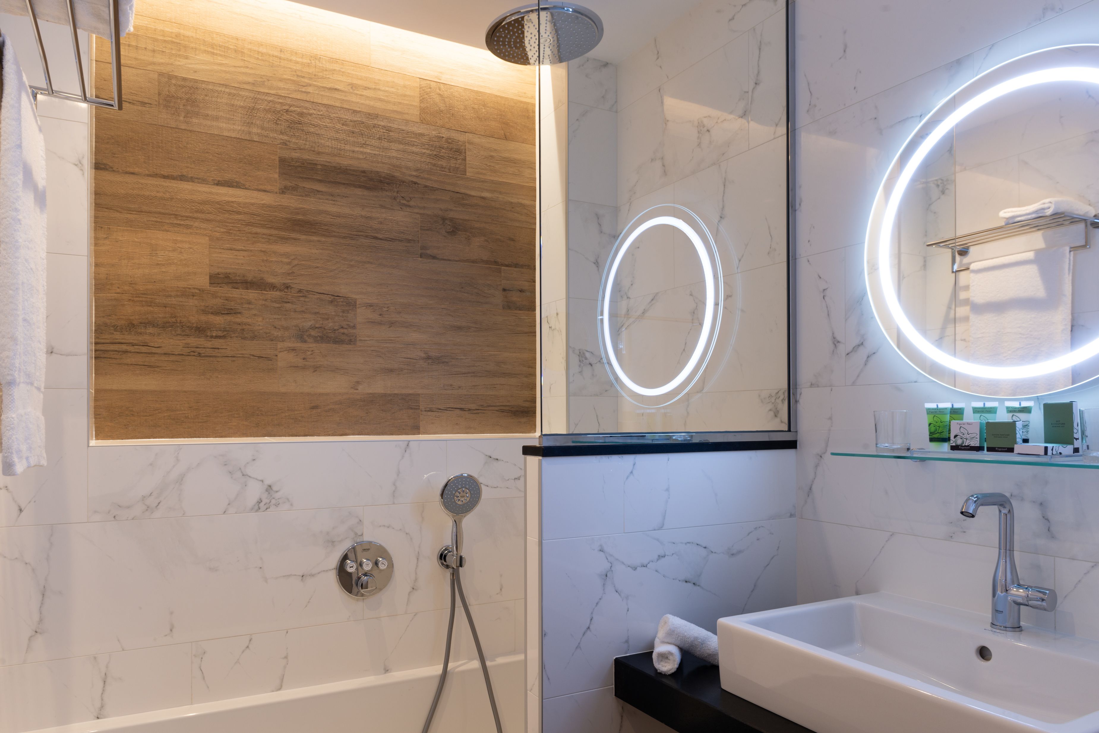 designer toiletries, hair dryer, bathrobes, slippers