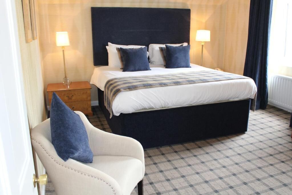 classic double or twin room | bathroom | combined shower/bathtub, hair dryer, towels, soap