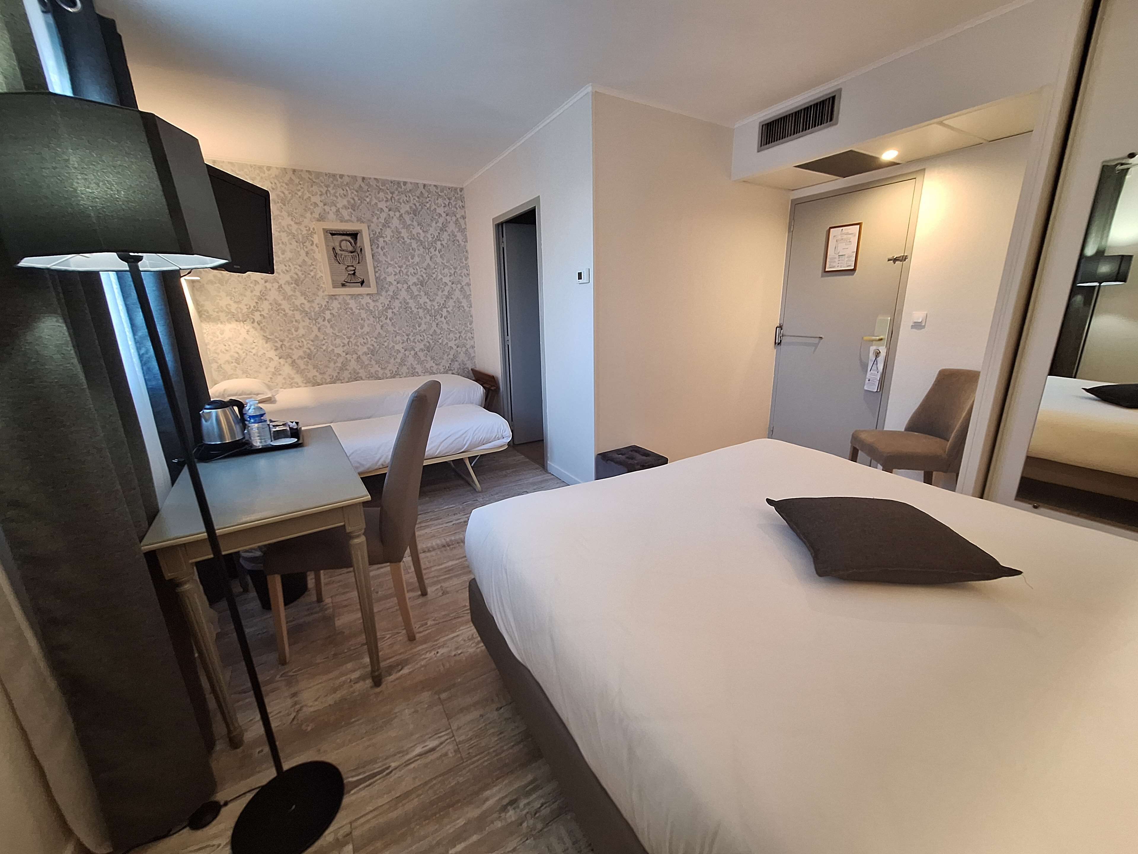 family room, multiple beds, non smoking | premium bedding, minibar, in-room safe, individually decorated