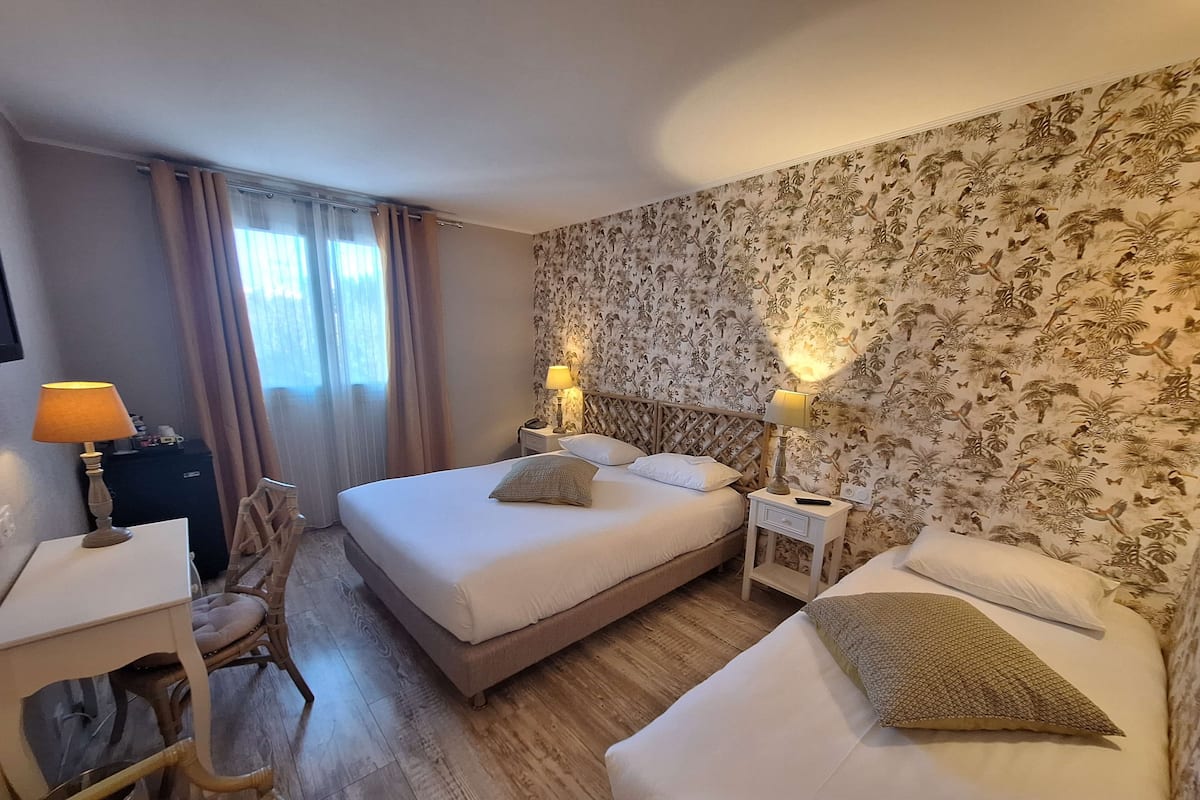 Family Room, Multiple Beds, Non Smoking | Premium bedding, minibar, in-room safe, individually decorated