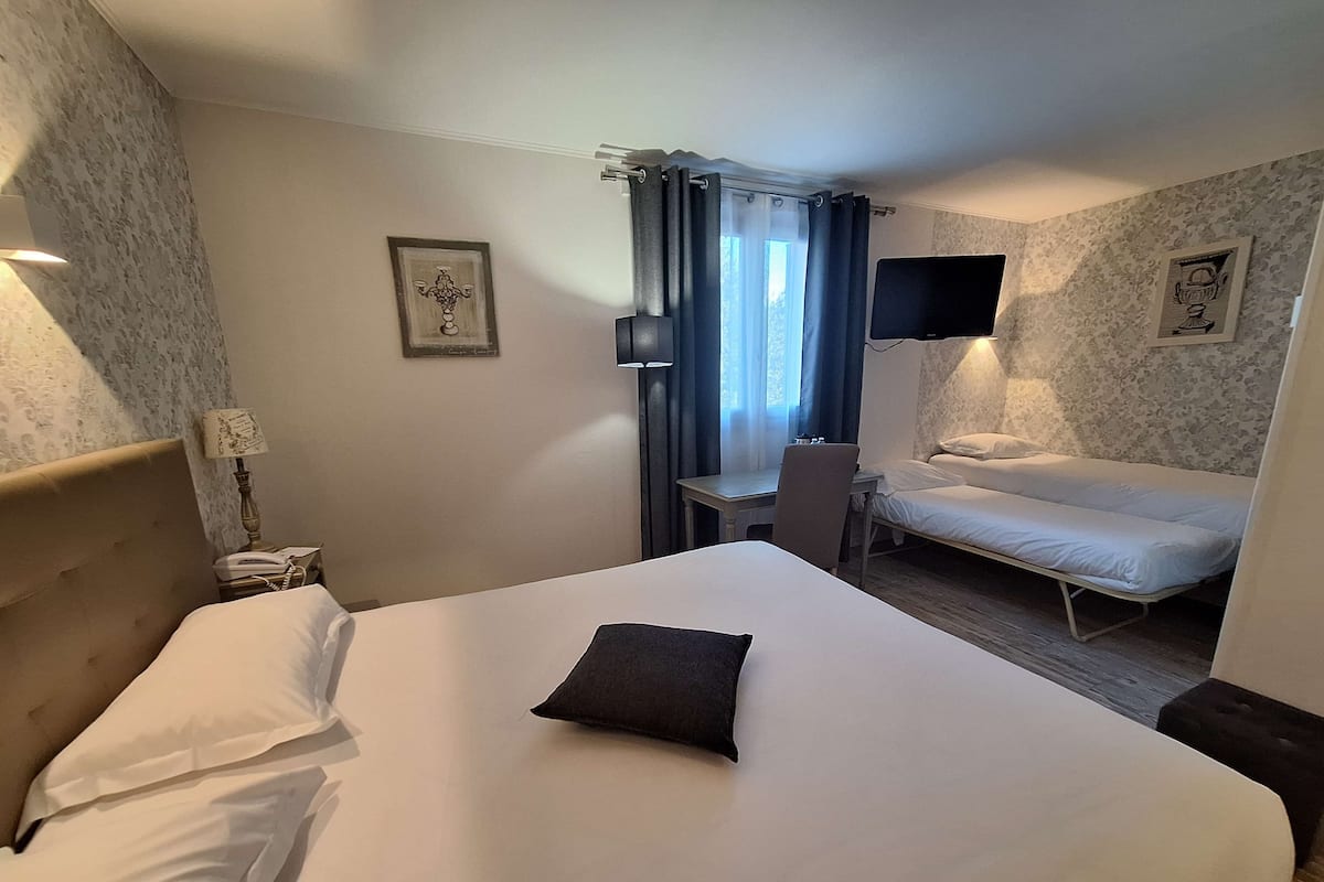 Family Room, Multiple Beds, Non Smoking | Premium bedding, minibar, in-room safe, individually decorated