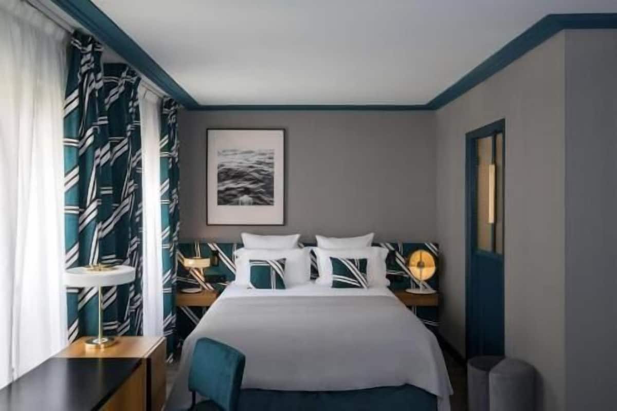 Premium bedding, pillow-top beds, in-room safe, desk