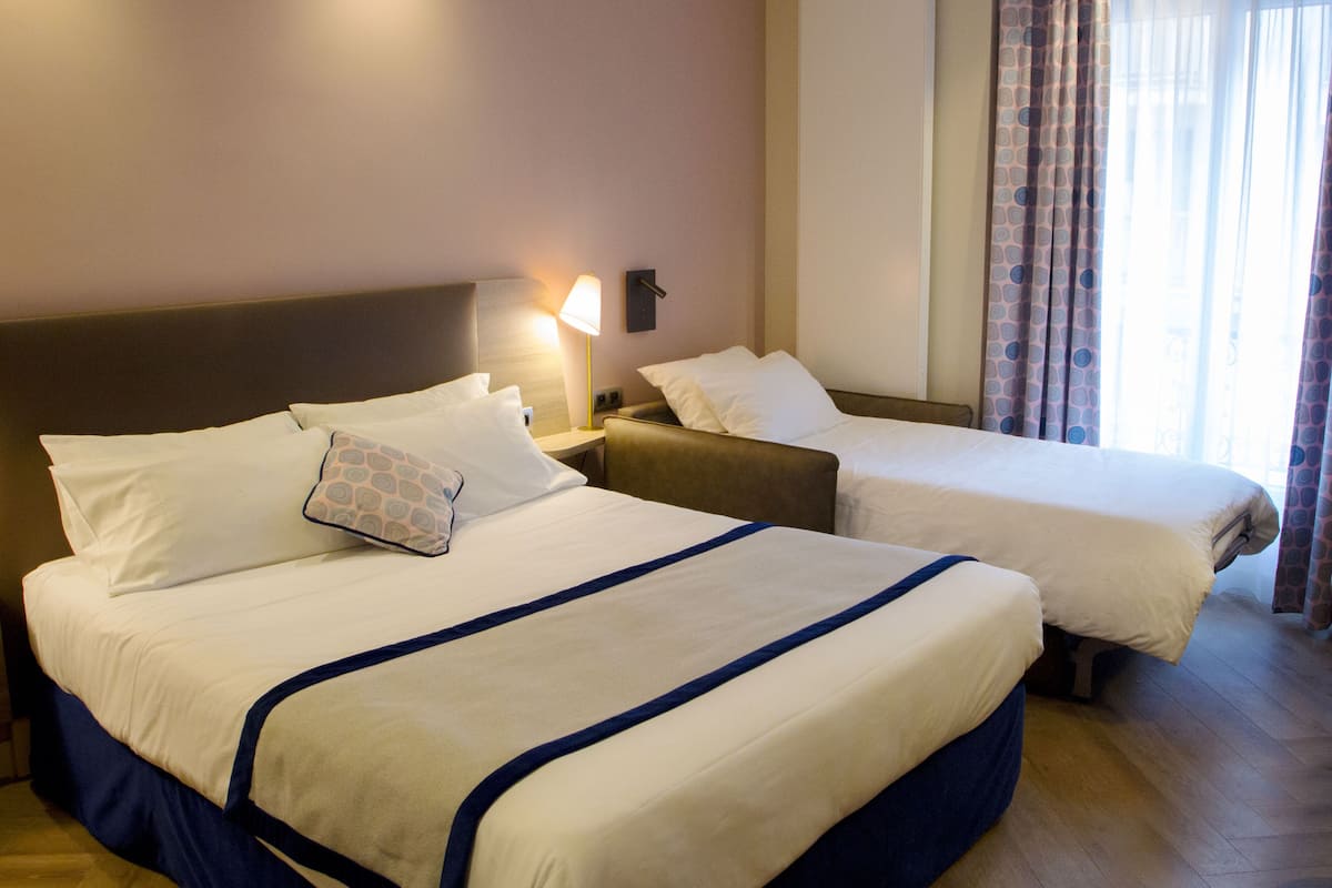 Superior Triple Room | Pillowtop beds, minibar, in-room safe, desk