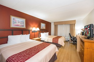 Deluxe Room, 2 Queen Beds, Non Smoking | In-room safe, desk, laptop workspace, blackout drapes