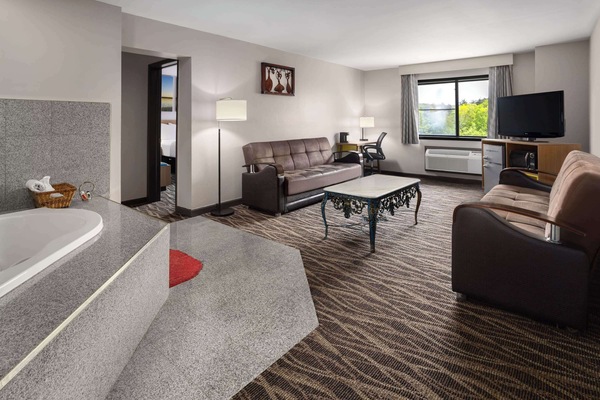 Suite, 1 King Bed, Non Smoking (1 Bedroom) | In-room safe, desk, laptop workspace, iron/ironing board