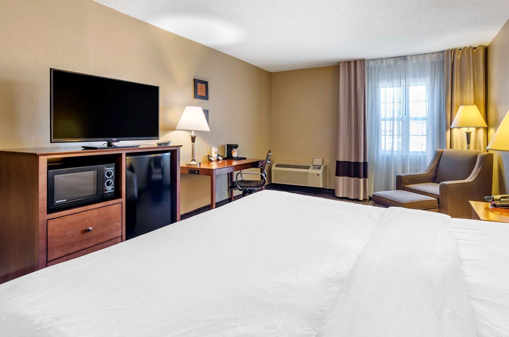 Premium bedding, pillowtop beds, blackout drapes, iron/ironing board
