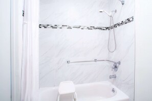 Bathtub, hair dryer, towels