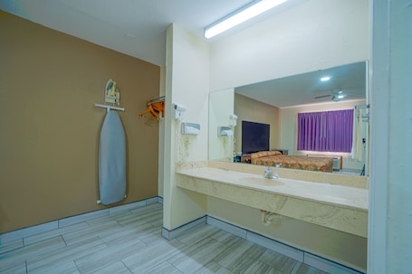 Room, 1 King Bed, Smoking | Bathroom | Free toiletries, hair dryer, towels