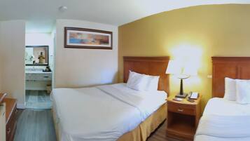 Room, 2 Queen Beds, Refrigerator & Microwave | Desk, iron/ironing board, free WiFi, bed sheets