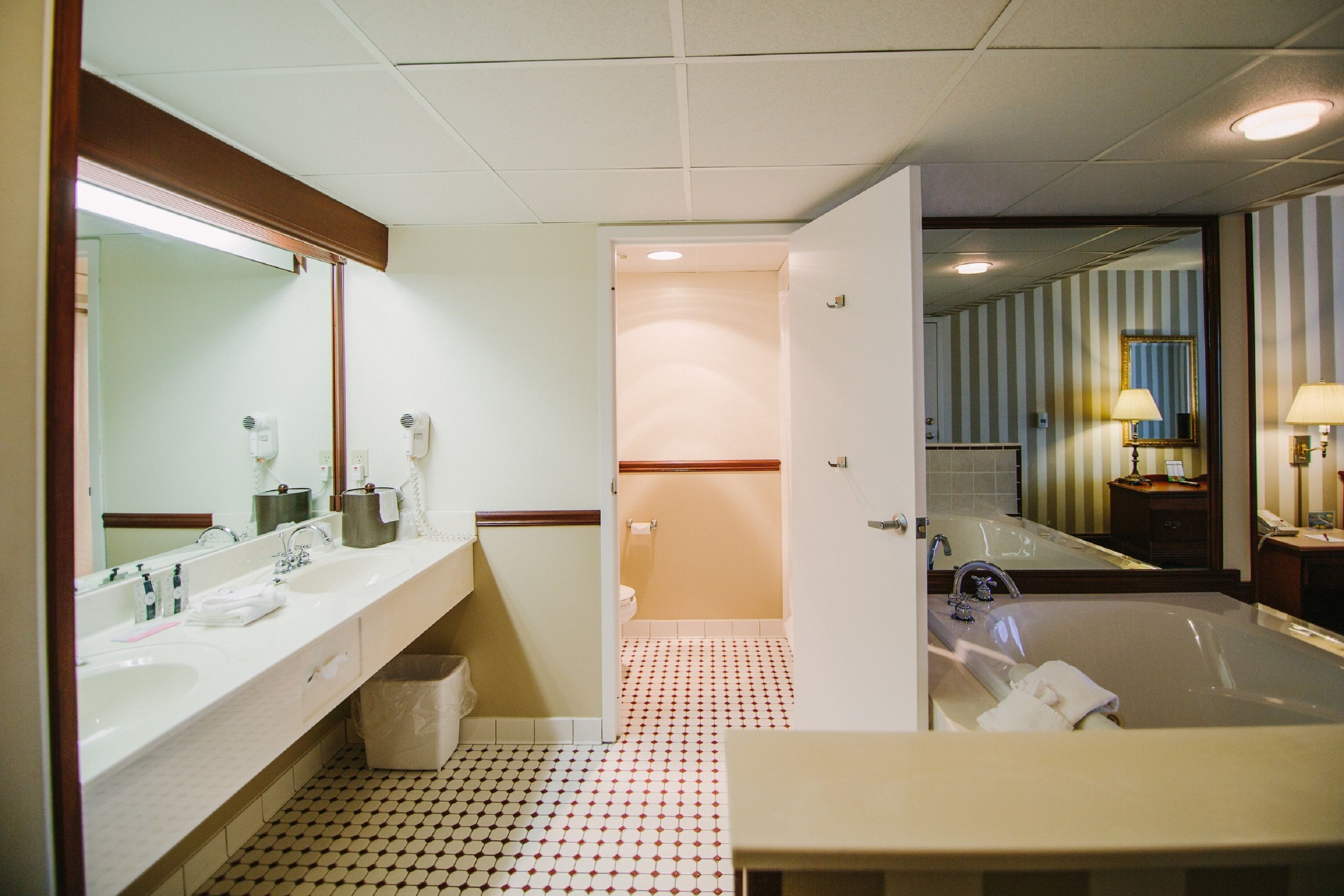 signature room, 1 king bed | bathroom | shower, free toiletries, hair dryer, towels
