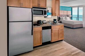 Full-sized fridge, microwave, stovetop, dishwasher