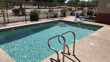 Outdoor pool, open 10:00 AM to 10:00 PM, sun loungers