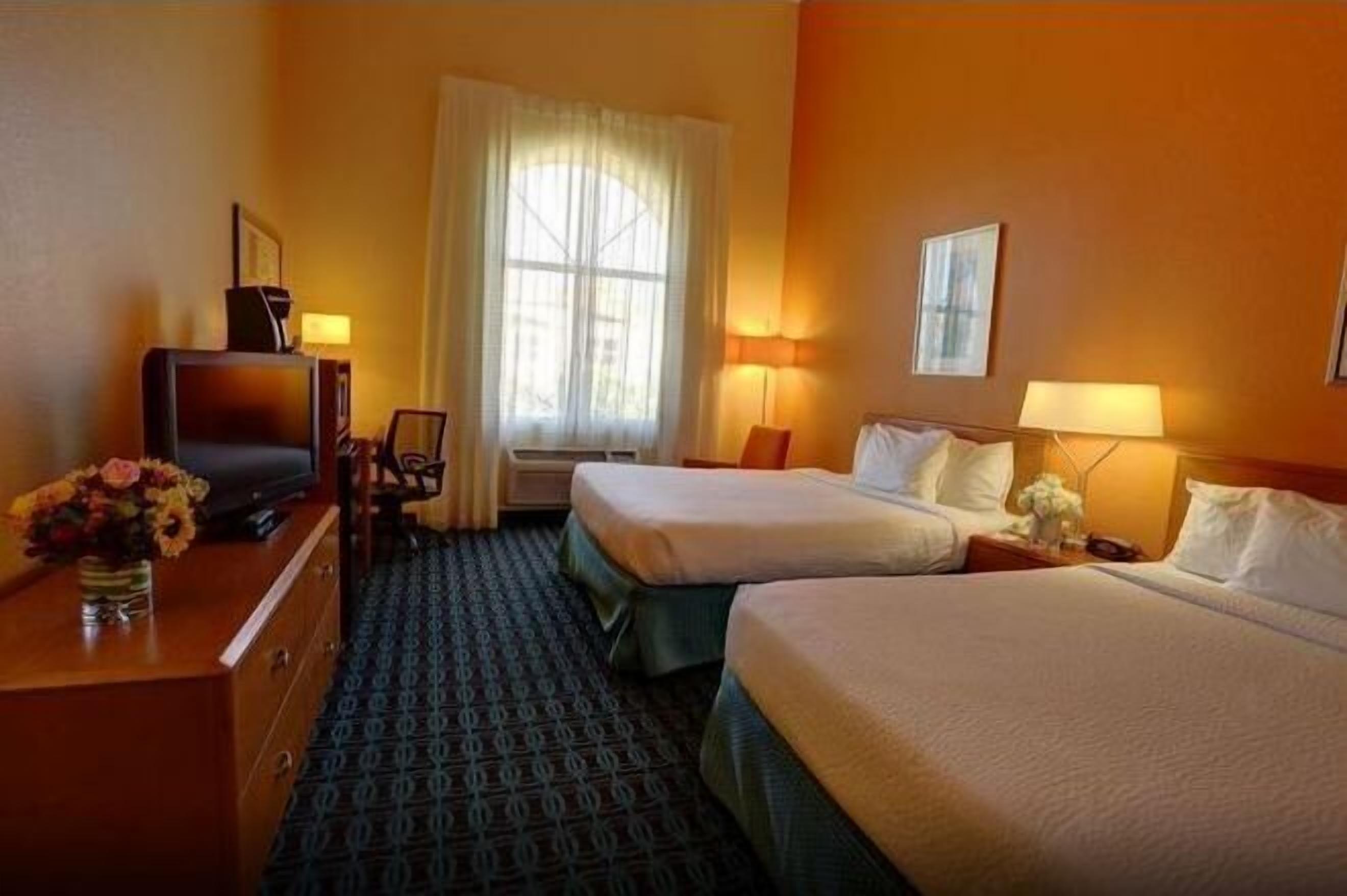 Pillowtop beds, in-room safe, desk, laptop workspace