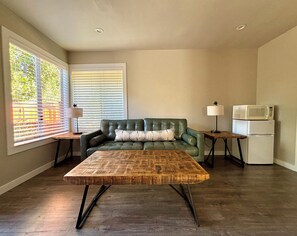 Valley View King Suite - Not Pet Friendly | Living area | 43-inch Smart TV with cable channels, TV - Hidden Valley Inn (Carmel Valley)