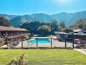 Outdoor pool, pool umbrellas, pool loungers