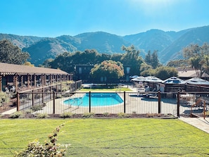 Outdoor pool, pool umbrellas, sun loungers