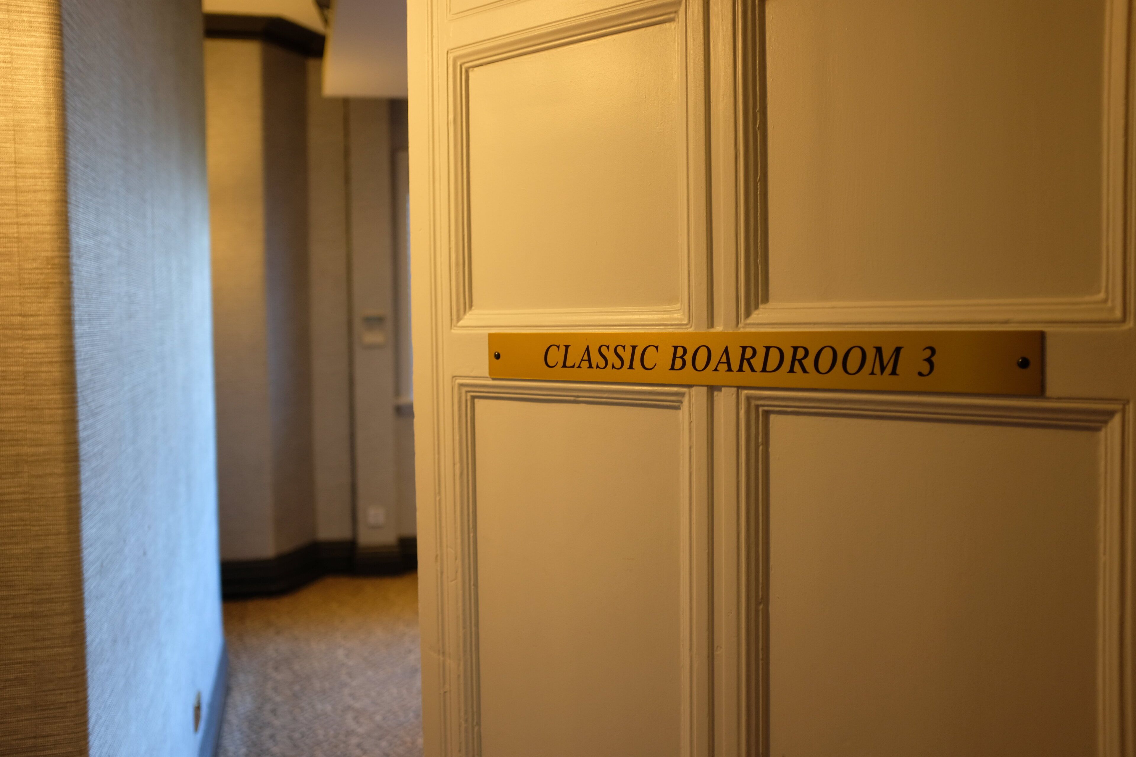 A door with a sign reading "Classic Boardroom 3".