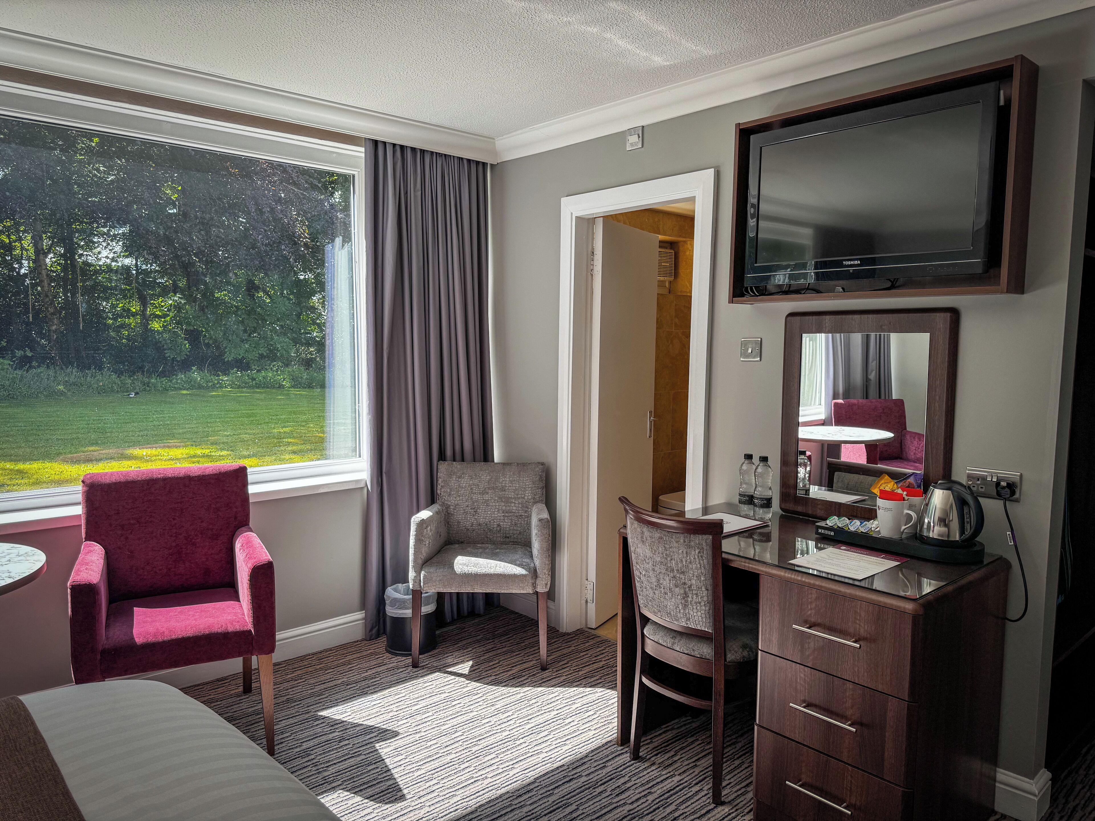 family room | desk, soundproofing, iron/ironing board, free wifi