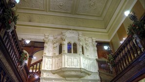 An ornate staircase with intricate woodwork and a decorative ceiling. - The Mount Country Manor Hotel & Golf (Wolverhampton)