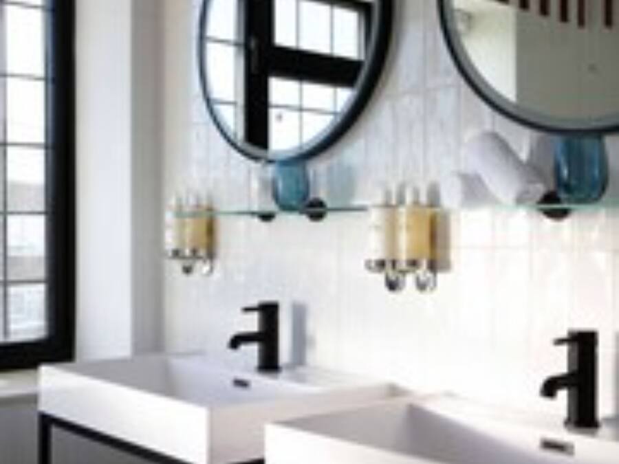 Shower, designer toiletries, hair dryer, slippers