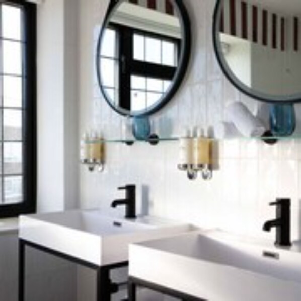Shower, designer toiletries, hair dryer, slippers