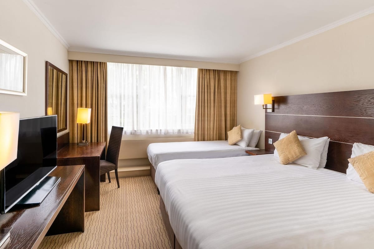 Family Room, Multiple Beds (Classic) | In-room safe, desk, iron/ironing board, free cribs/infant beds