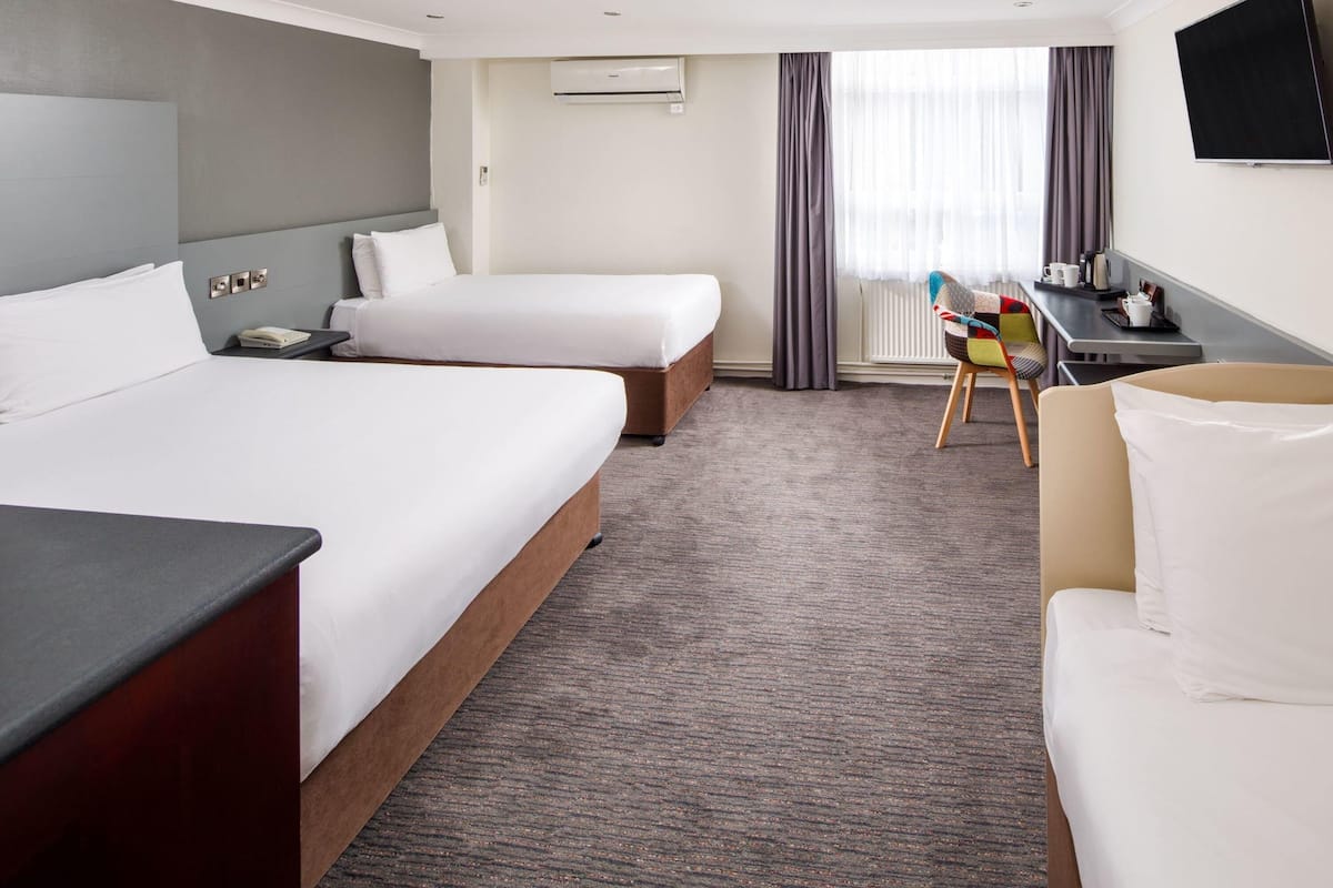 Family Room, Multiple Beds (2 Adults and 2 Children) | In-room safe, desk, iron/ironing board (on request), cribs (free)