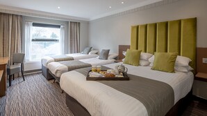 A hotel room with two beds, a desk, and a breakfast tray. - The Hog's Back Hotel & Spa Farnham (Farnham)