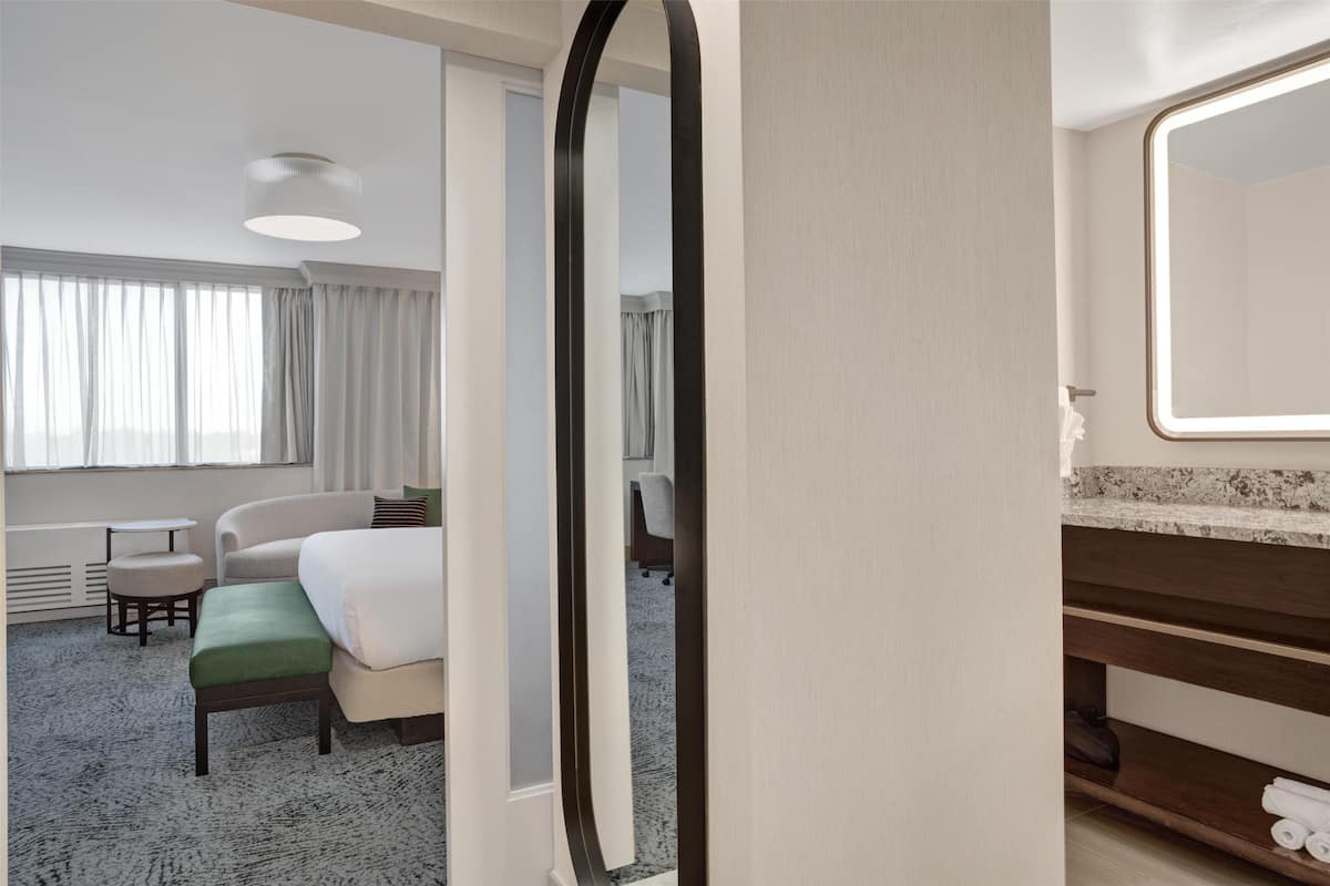 Suite, 1 King Bed | Hypo-allergenic bedding, in-room safe, blackout drapes, soundproofing