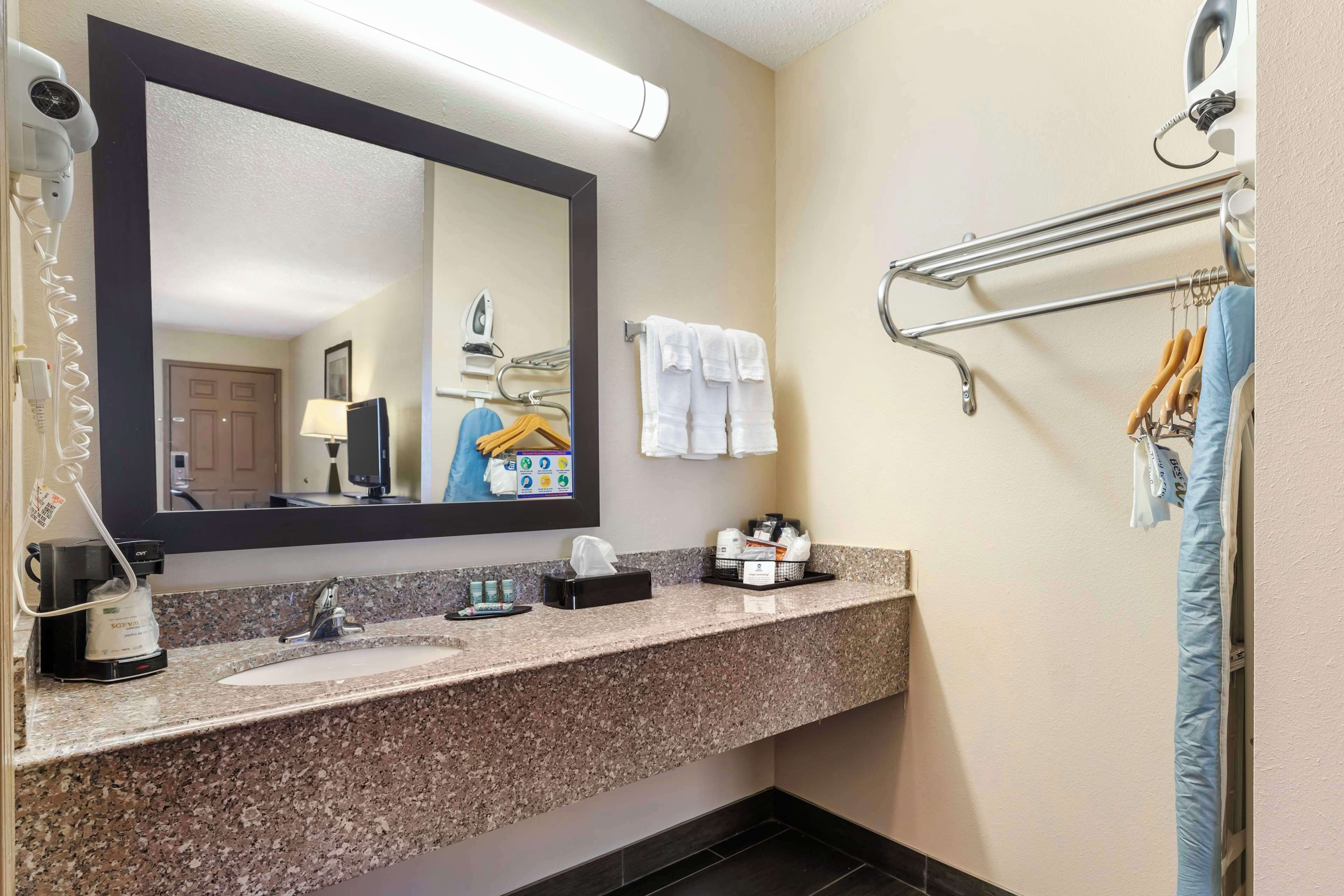 standard room, 2 queen beds, non smoking, refrigerator & microwave | bathroom | combined shower/bathtub, free toiletries, hair dryer, towels