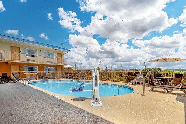 Seasonal outdoor pool, open 7 AM to 9 PM, sun loungers