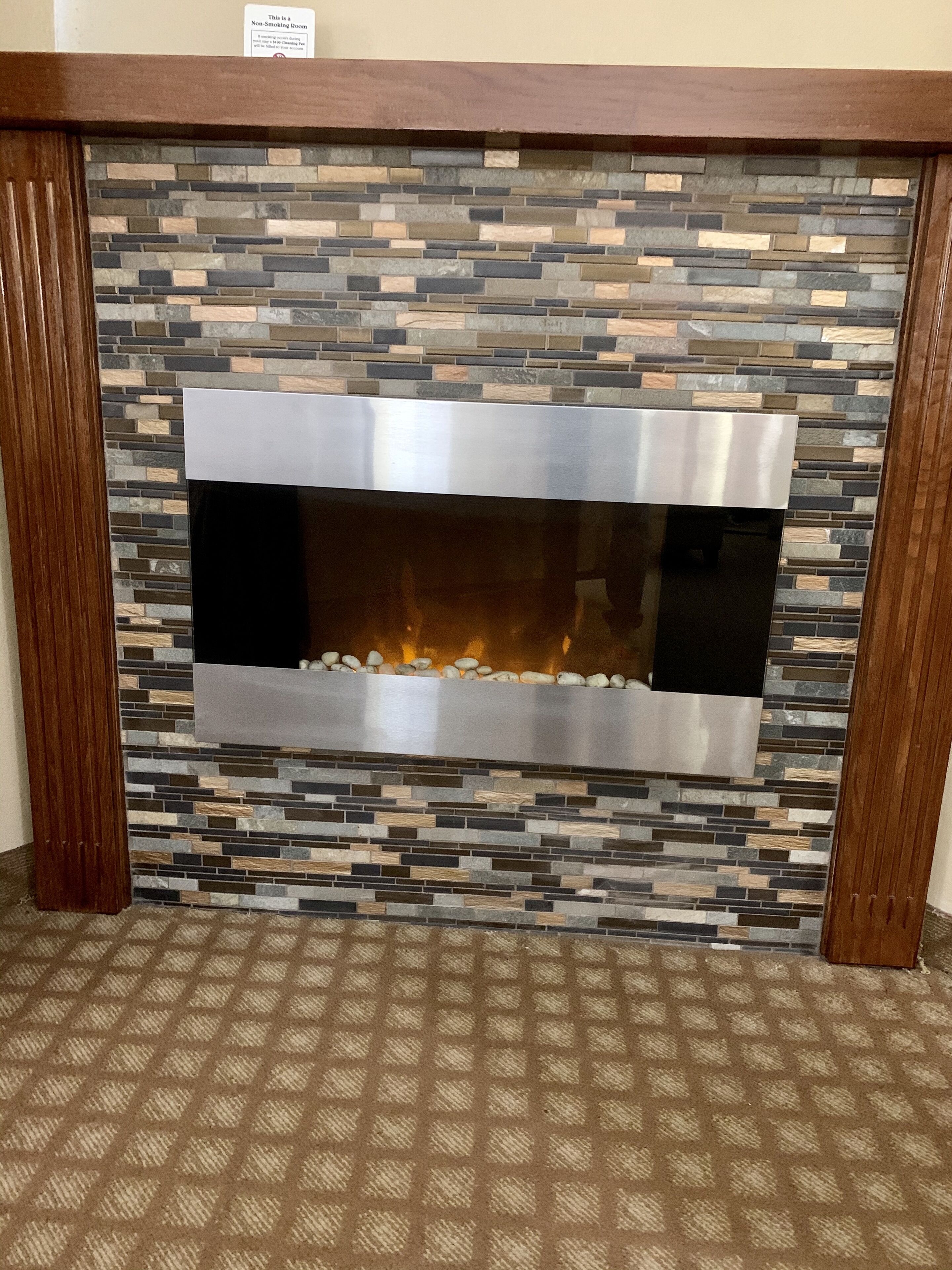 room, 1 king bed, non smoking, fireplace | desk, iron/ironing board, free cots/infant beds, rollaway beds