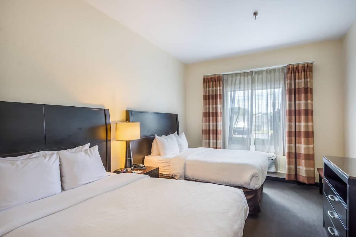 Suite, 2 Double Beds, Non Smoking (Interior Corridor) | Pillowtop beds, in-room safe, desk, iron/ironing board