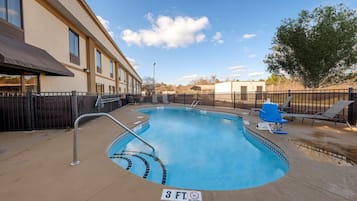 Seasonal outdoor pool, pool umbrellas, sun loungers