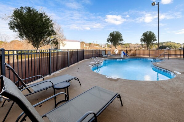 Seasonal outdoor pool, pool umbrellas, pool loungers