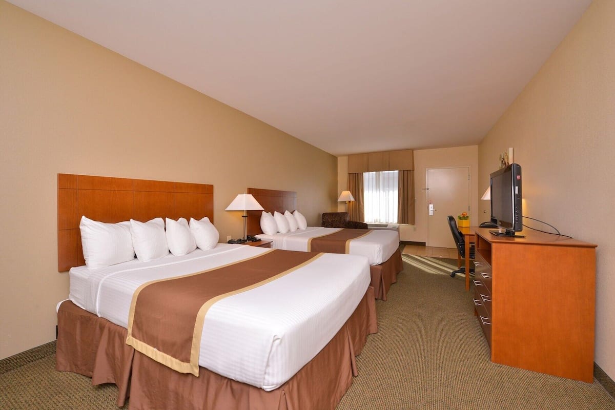 Premium bedding, pillowtop beds, desk, laptop workspace