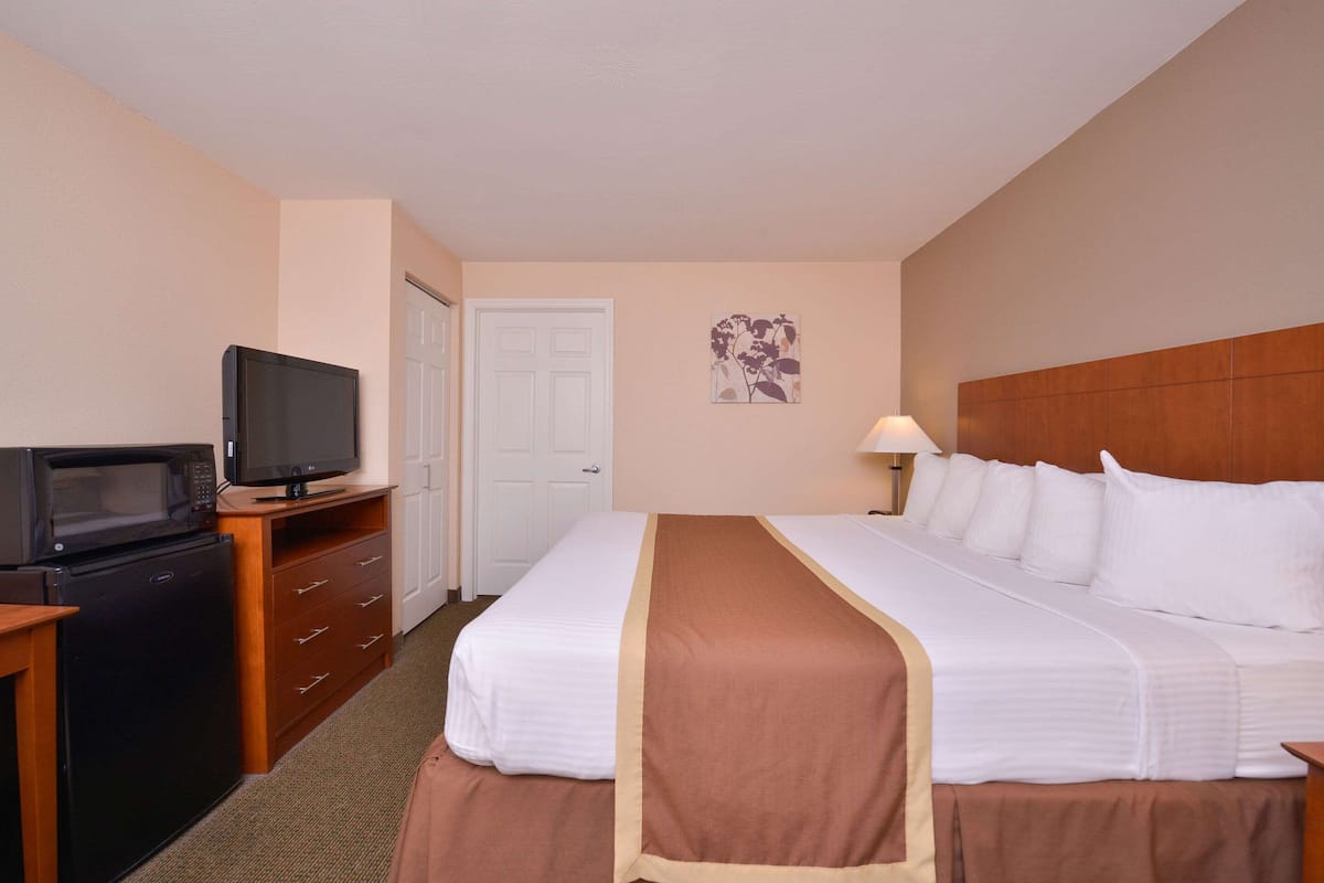 Premium bedding, pillow-top beds, desk, laptop workspace