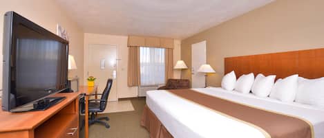 Premium bedding, pillow-top beds, desk, laptop workspace