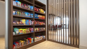A snack display with various packaged foods.