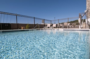 Seasonal outdoor pool, pool loungers